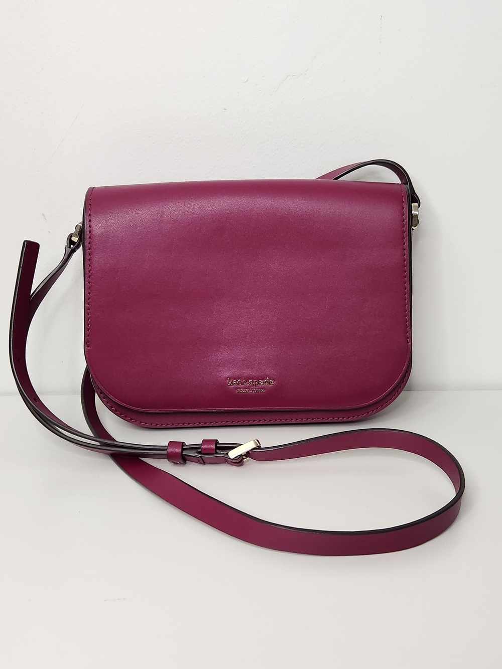 Kate Spade fuchsia leather flap crossbody